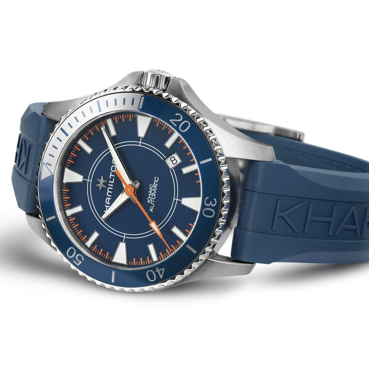 Men's diver watch front-right angle; blue dial with orange markers, steel case, blue rubber strap