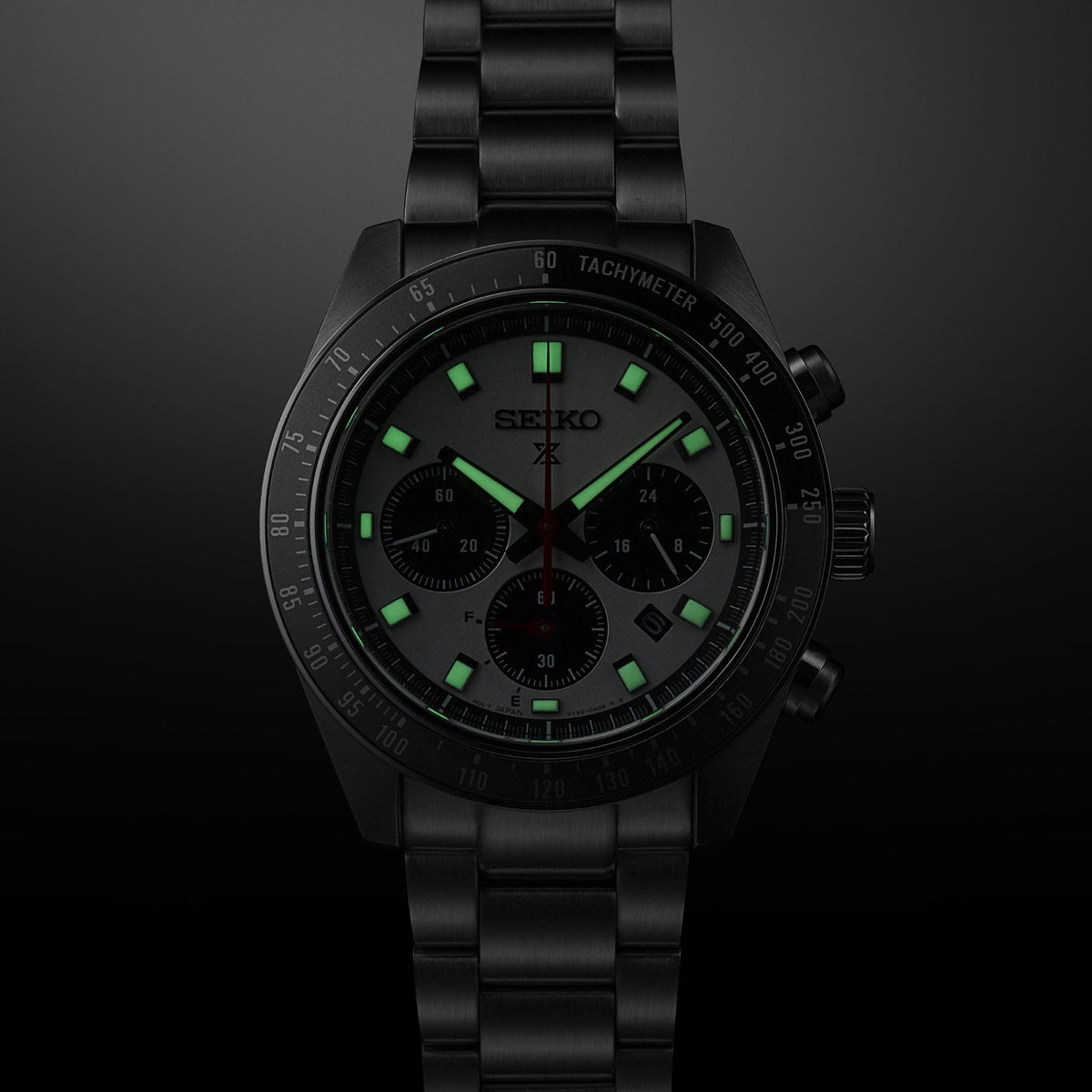 Men’s solar chronograph watch with black stainless bracelet and green-accent dial