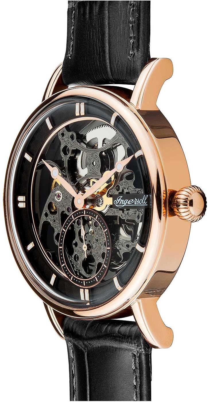 Automatic skeleton watch angled side view with black leather strap and rose-gold case