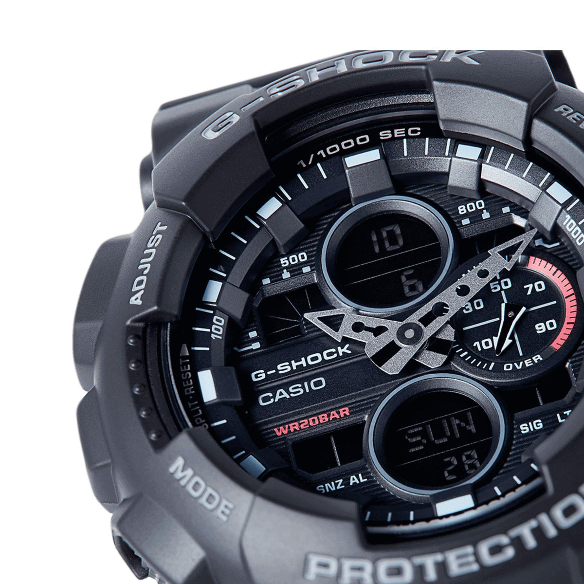 Casio G-Shock watch close-up with black analogue-digital dial and red-tinted subdial.