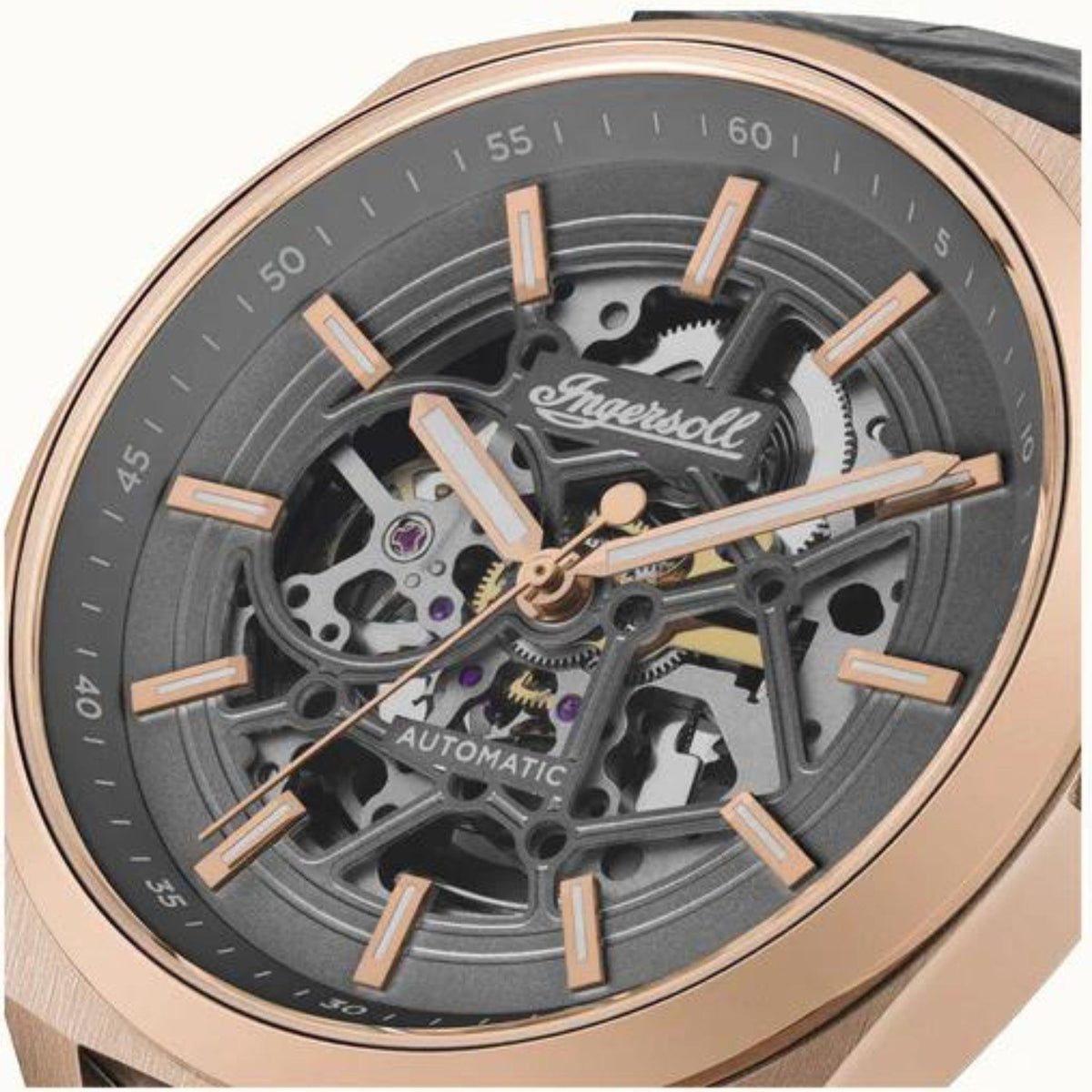 Close-up of grey skeleton dial showing Ingersoll logo and automatic movement