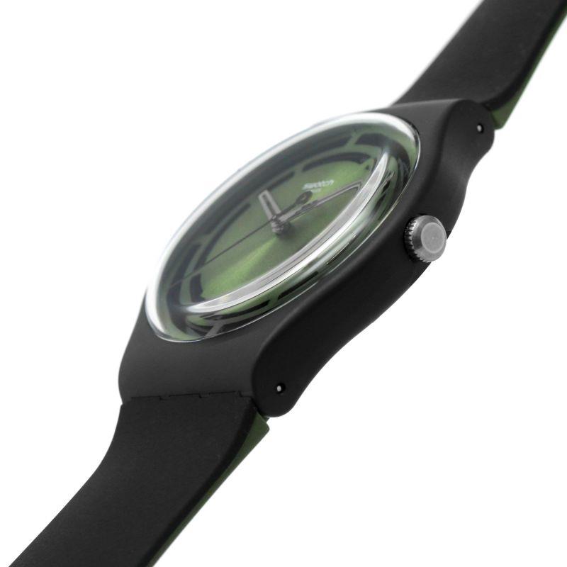 Swatch watch close-up with olive-green dial and black silicone strap