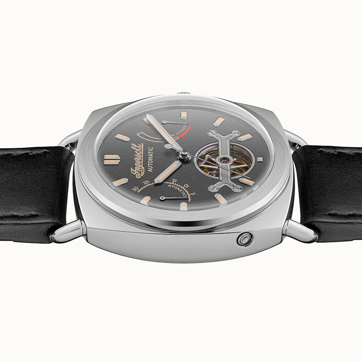 Men's automatic watch with grey dial and skeleton movement, black leather strap.