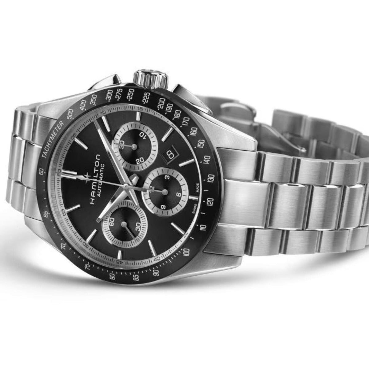 Men's chronograph watch angled view with black dial, three subdials, stainless steel strap.
