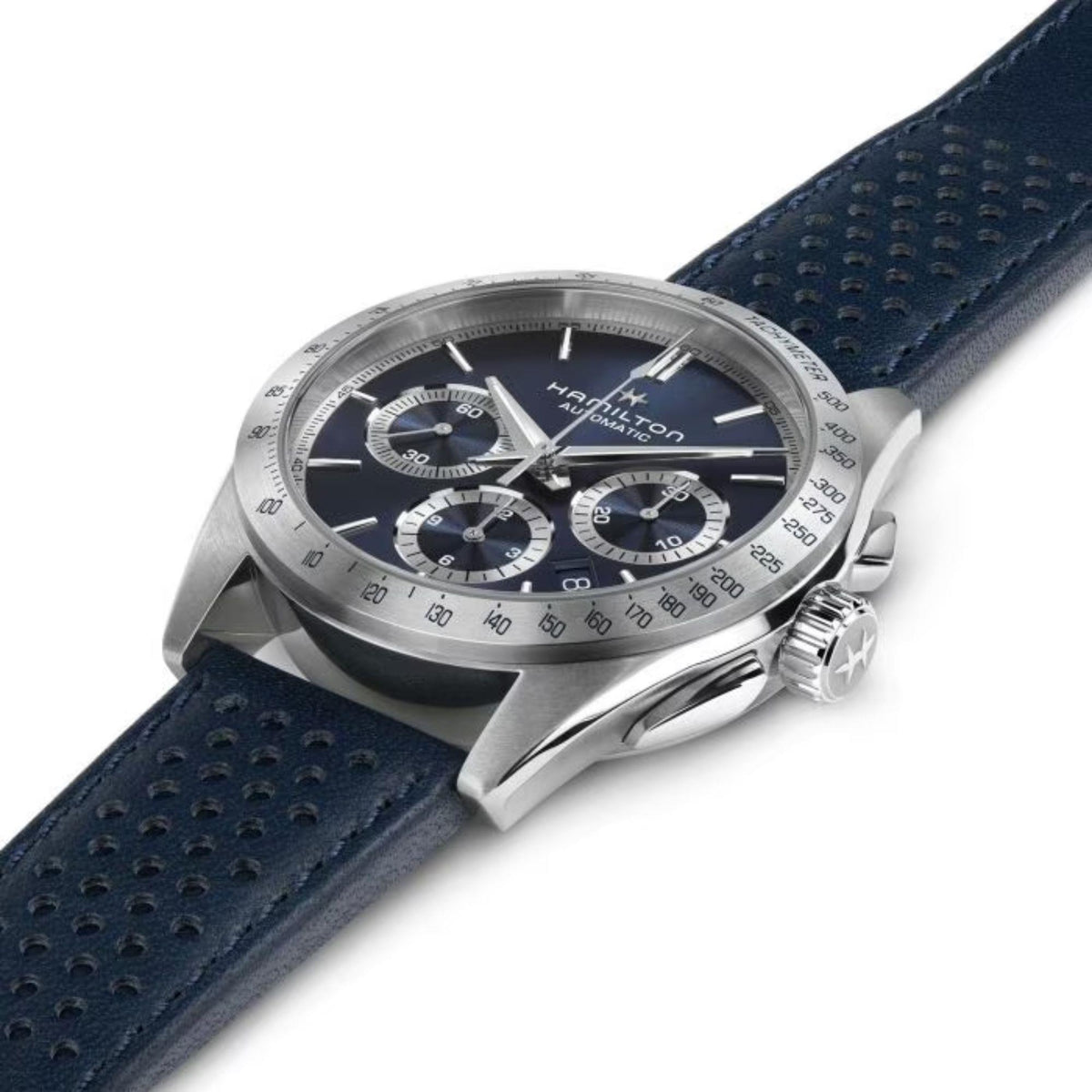 Men's automatic chronograph watch close-up angle, blue dial, navy leather strap, silver crown.