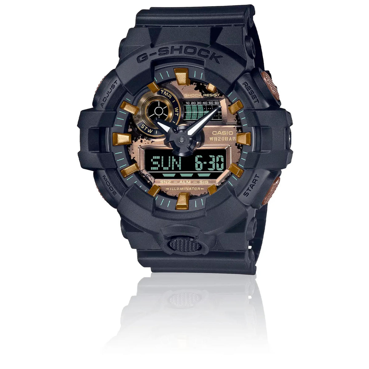 Men's black G-SHOCK digital watch with gold-ring bezel, resin strap, display shows Sun 8:30.