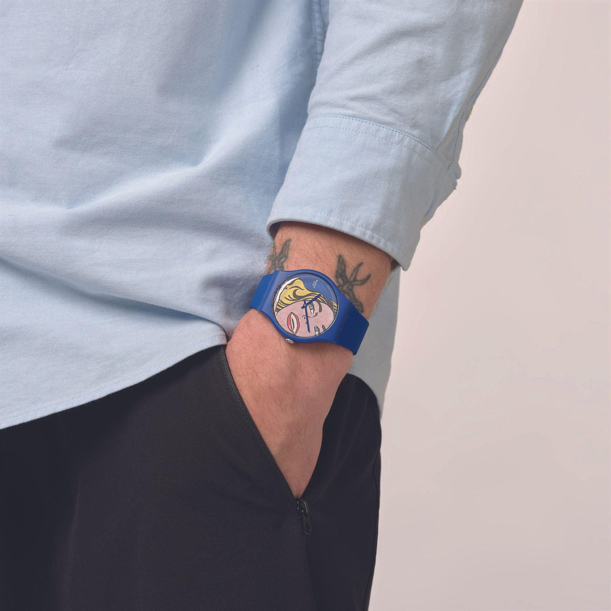 Blue silicone strap watch with colorful pop-art girl face dial