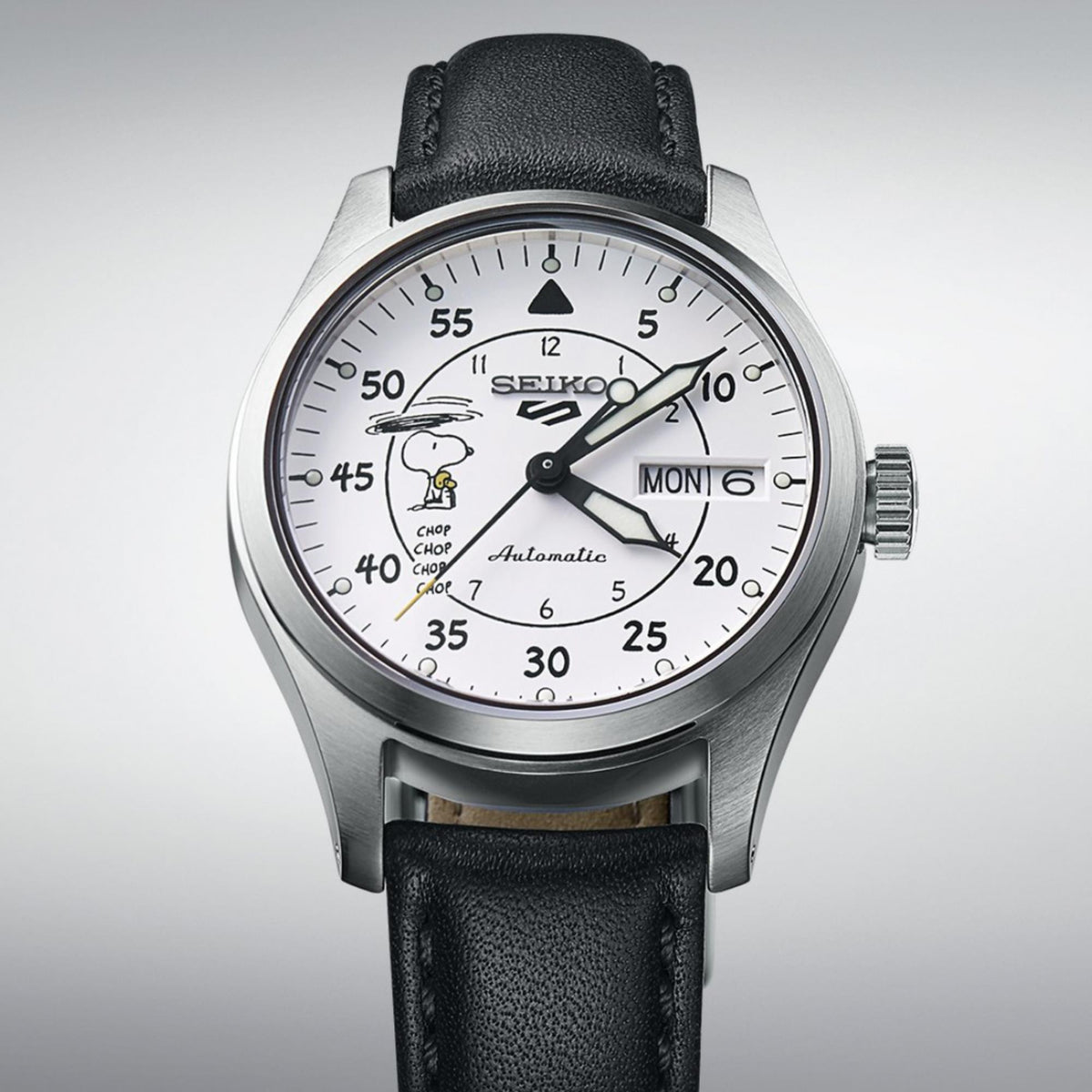 Automatic white dial wristwatch with black leather strap, round steel case and subdials
