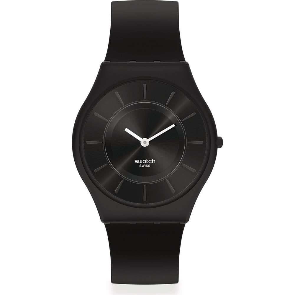 Men's black Swatch watch with round dark dial, slim markers, and rubber strap
