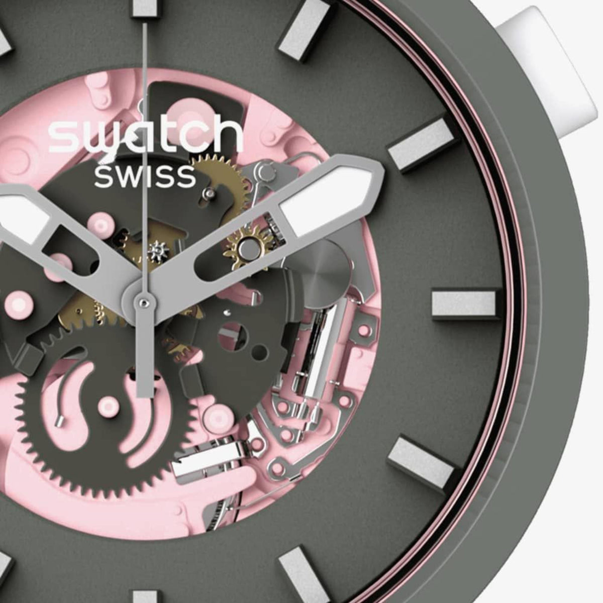 Women’s Swatch skeleton-dial watch close-up with dark bezel, pink gears, silver hands