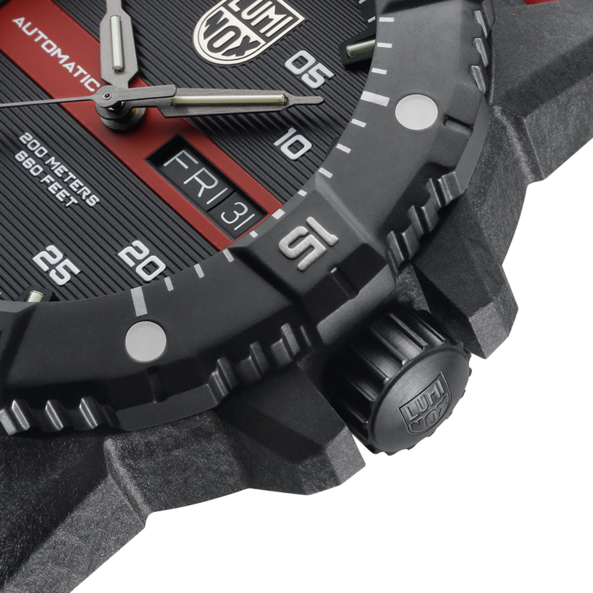 Close-up watch dial with date window “FRI 31” and black case with crown guard
