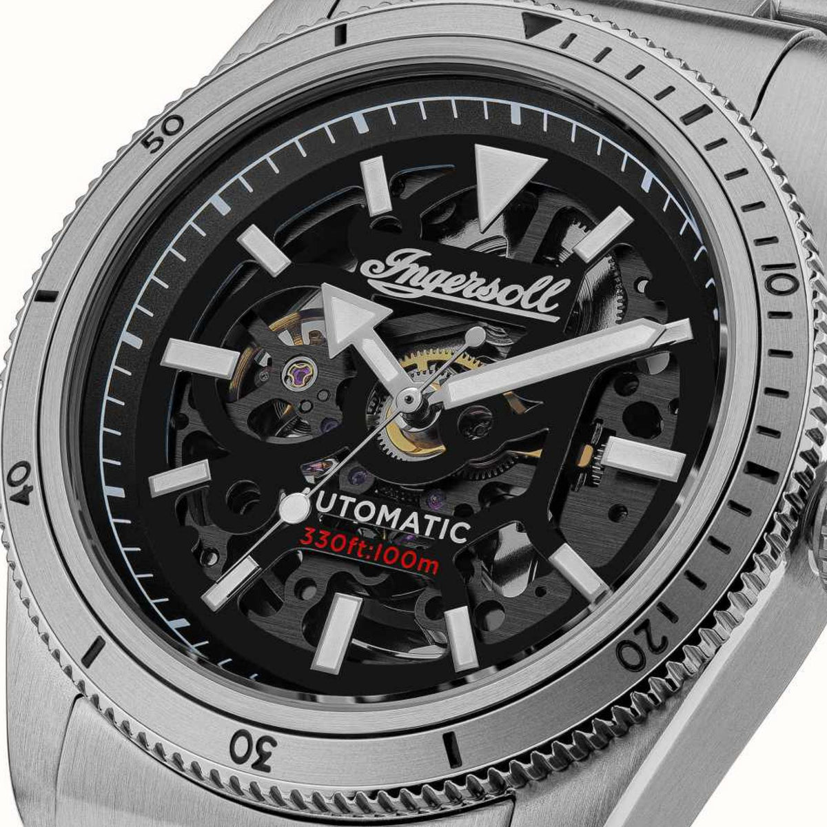 Close-up of men's black skeleton dial with silver markers and detailed automatic movement.