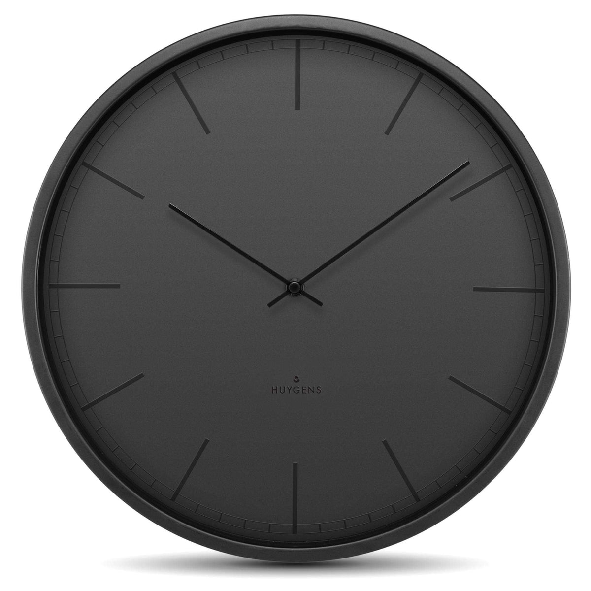 Black round wall clock with three hands and Huygens logo centered on the dial
