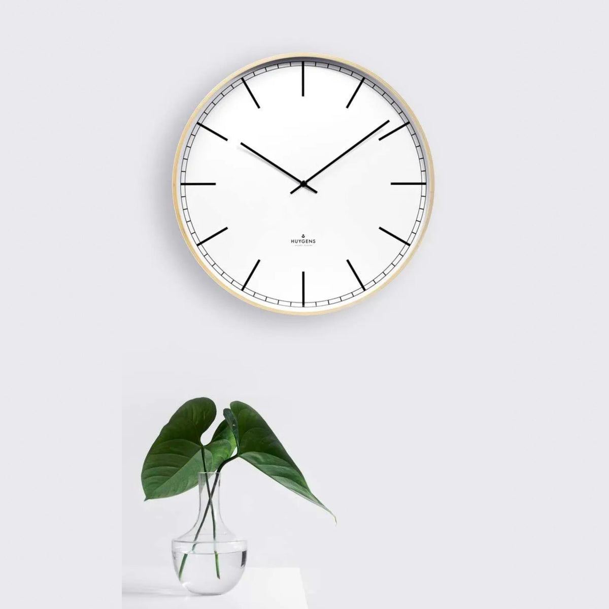 Wood index wall clock with gold rim, white dial, black hands and index markers