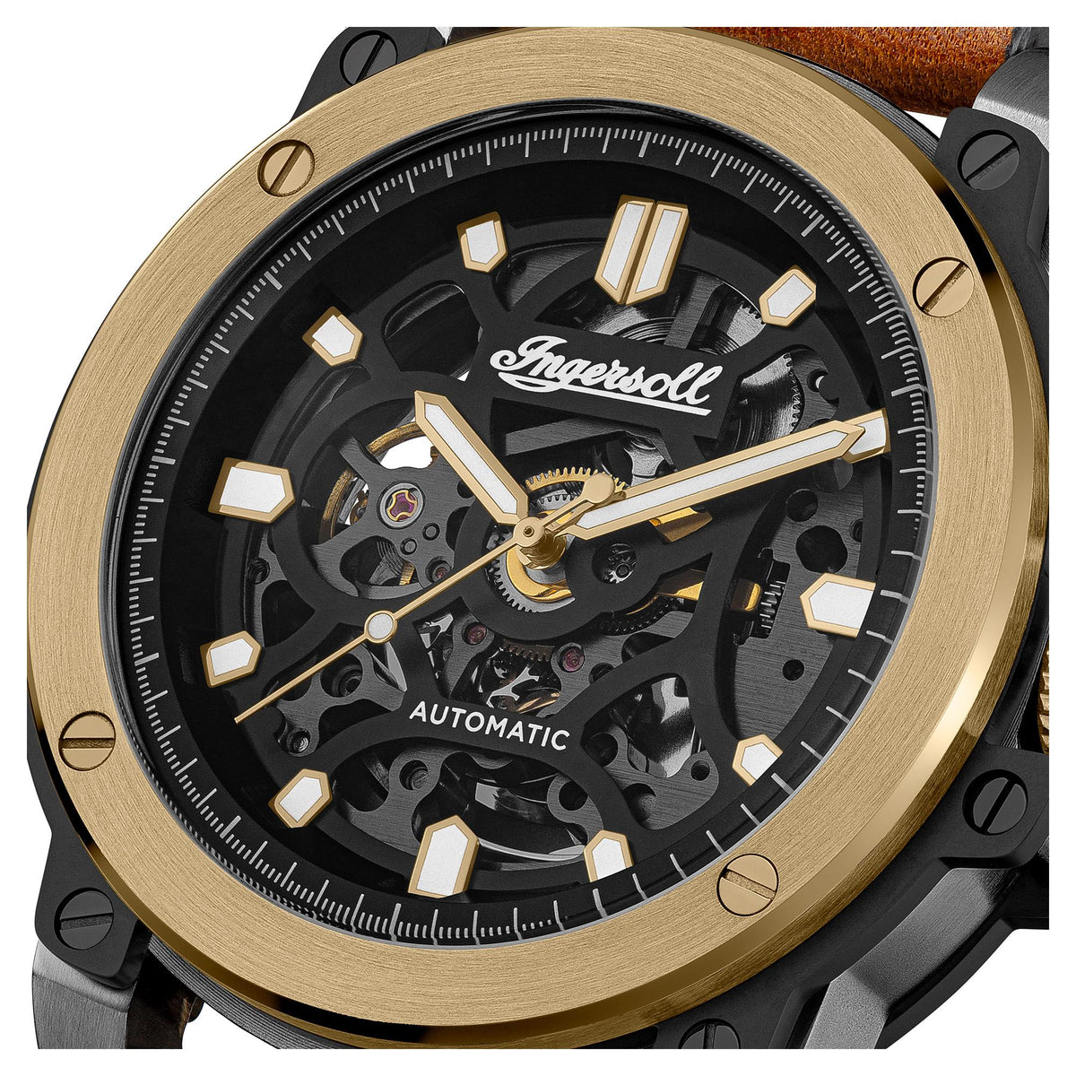 Close-up skeleton dial with black face, gold-tone hour markers, and automatic label