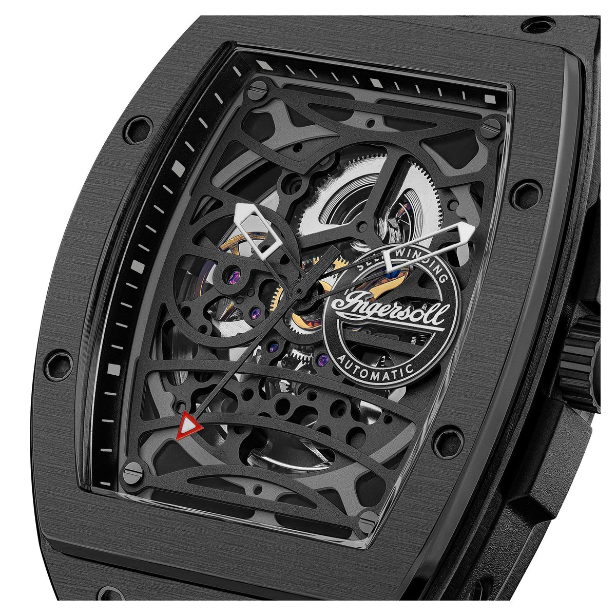 Close-up of black skeleton watch dial showing gears and rotating balance wheel