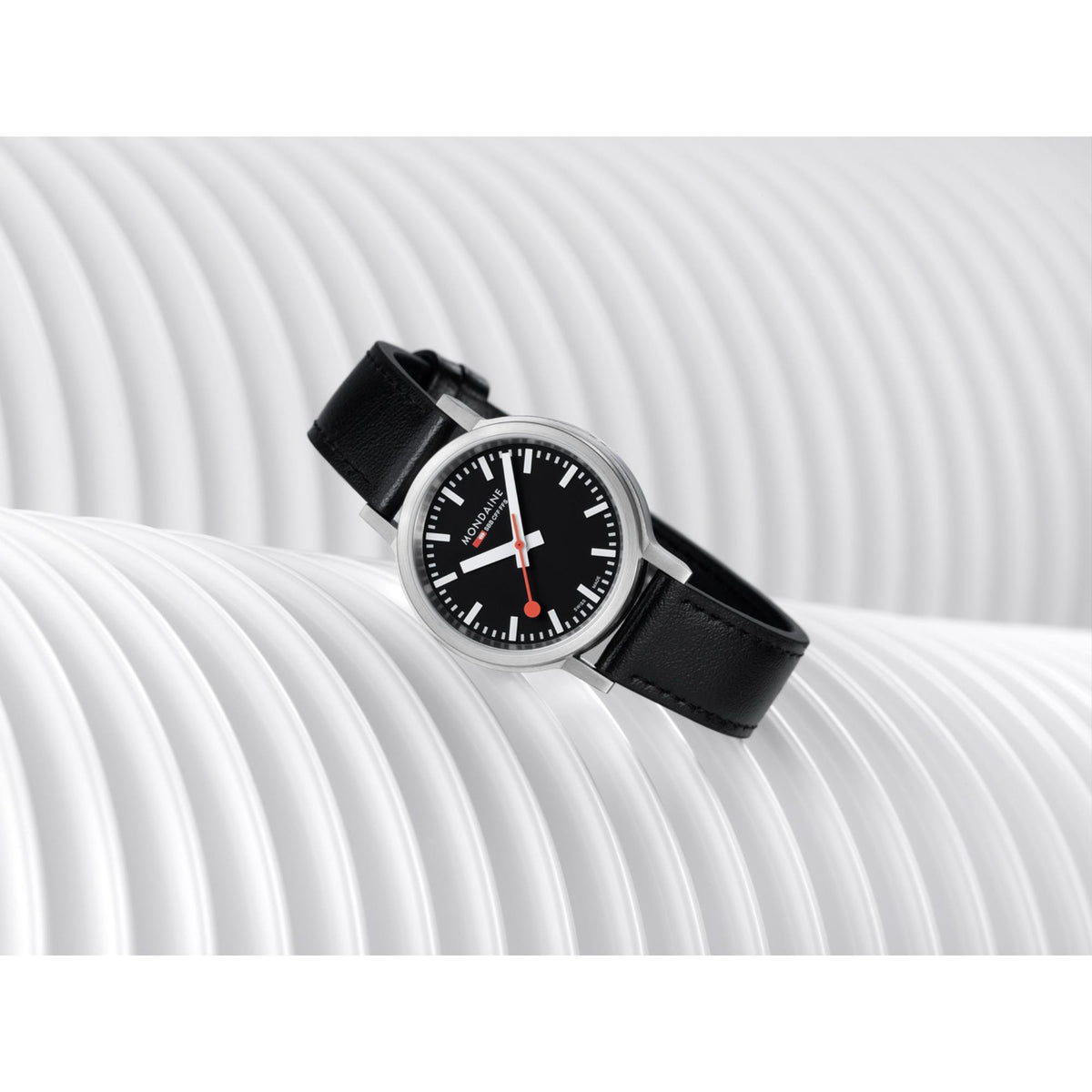 Black dial quartz watch with black leather strap and silver-tone round case