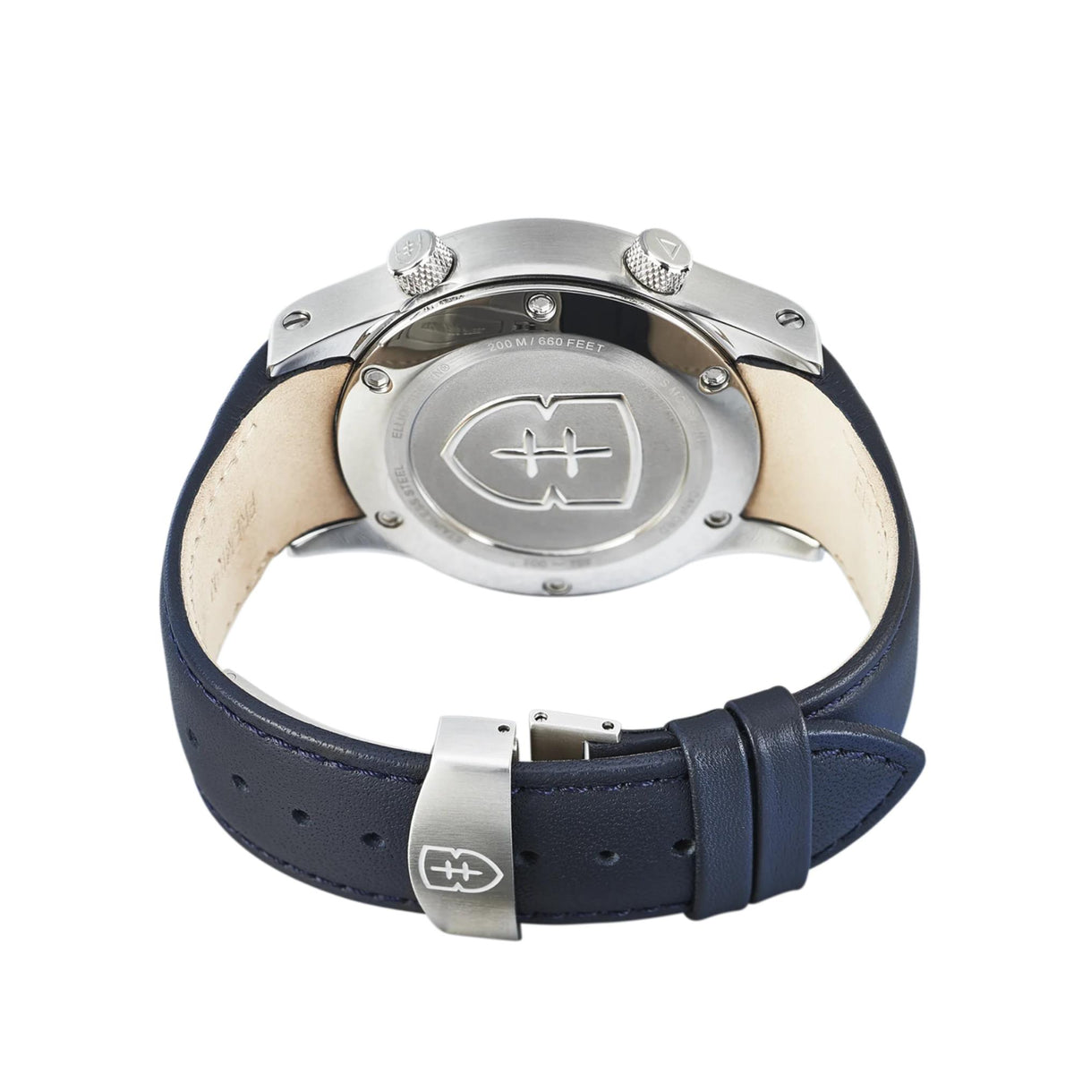 Men's watch with blue leather strap and silver caseback featuring twin-ring emblem