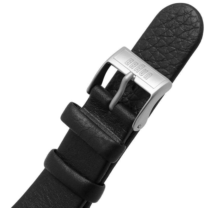 Black leather watch strap with metal buckle clasp featuring Braun logo
