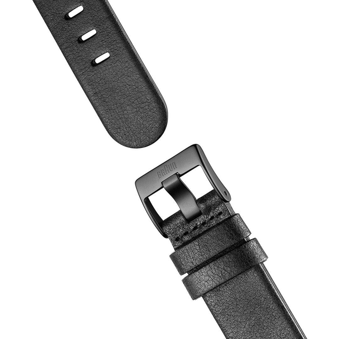 Braun quartz men's watch with black leather strap and buckle, close-up