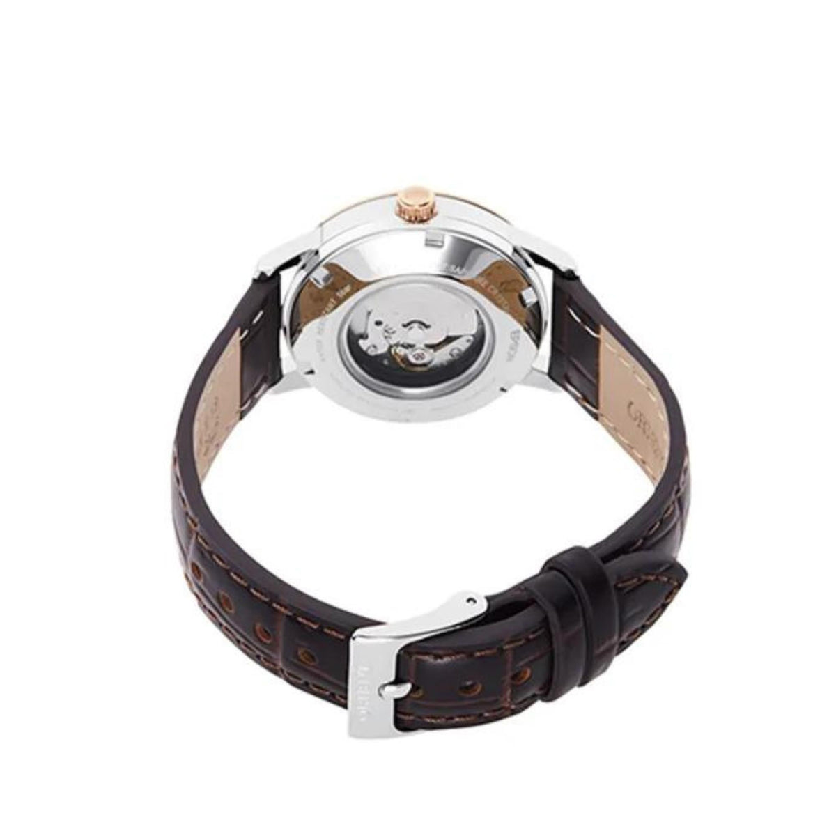 Automatic watch side view with leather strap, silver caseback and crown detail
