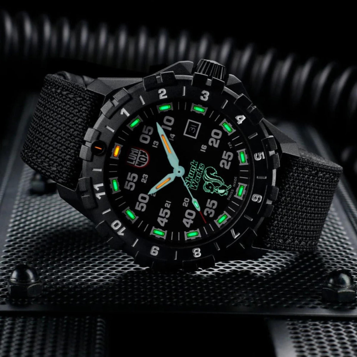 Men's black dial quartz wristwatch with neon markers on black textile strap