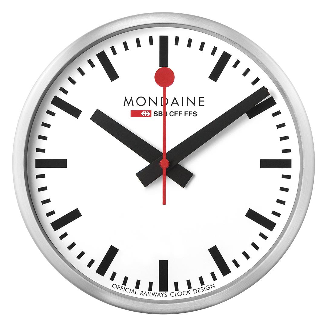 Wall clock with white dial, black hour markers, red center hands, and silver bezel