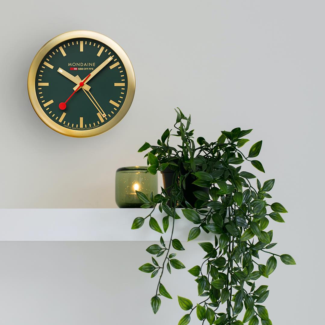 Forest green dial table alarm clock with gold-tone case, red hands and hour markers