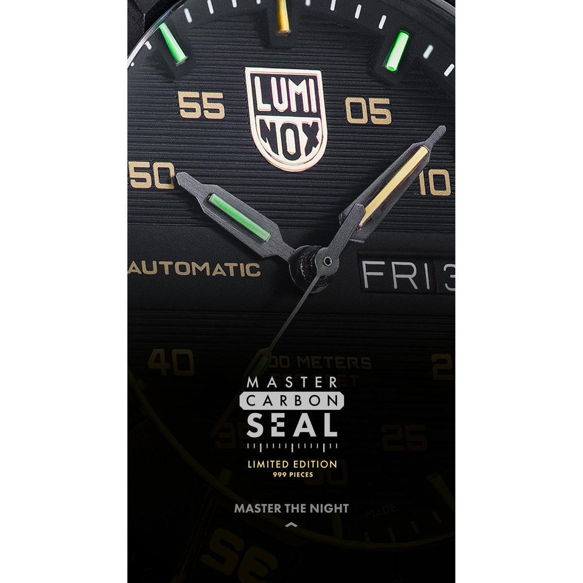 Close-up of black dial with gold text and Master Carbon Seal engraving