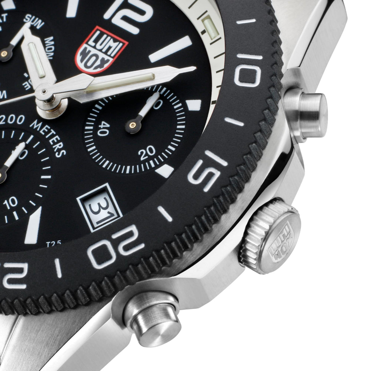 Close-up of stainless steel diver chronograph case with black bezel and textured crown.