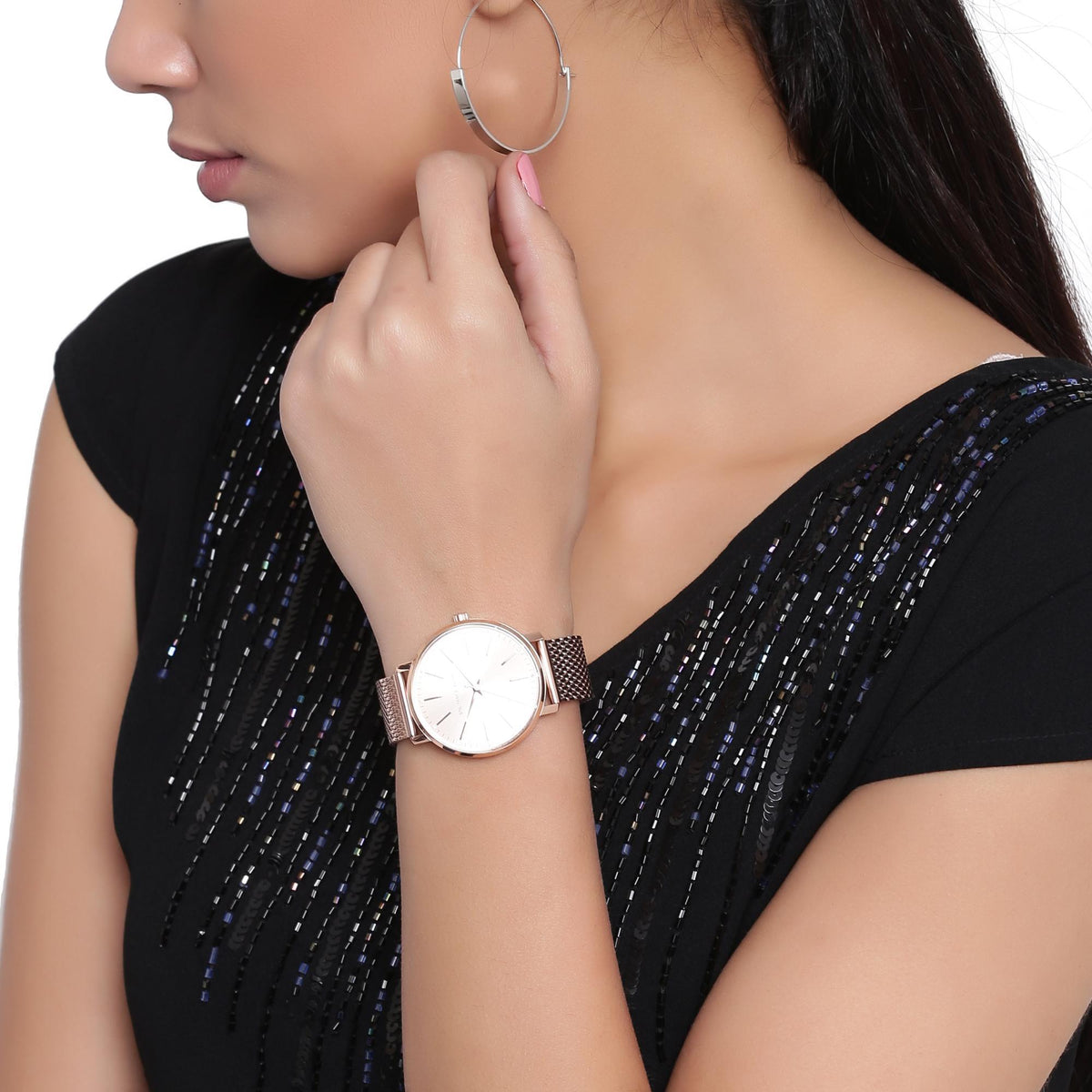 Rose gold-tone wristwatch with white dial and stainless link bracelet