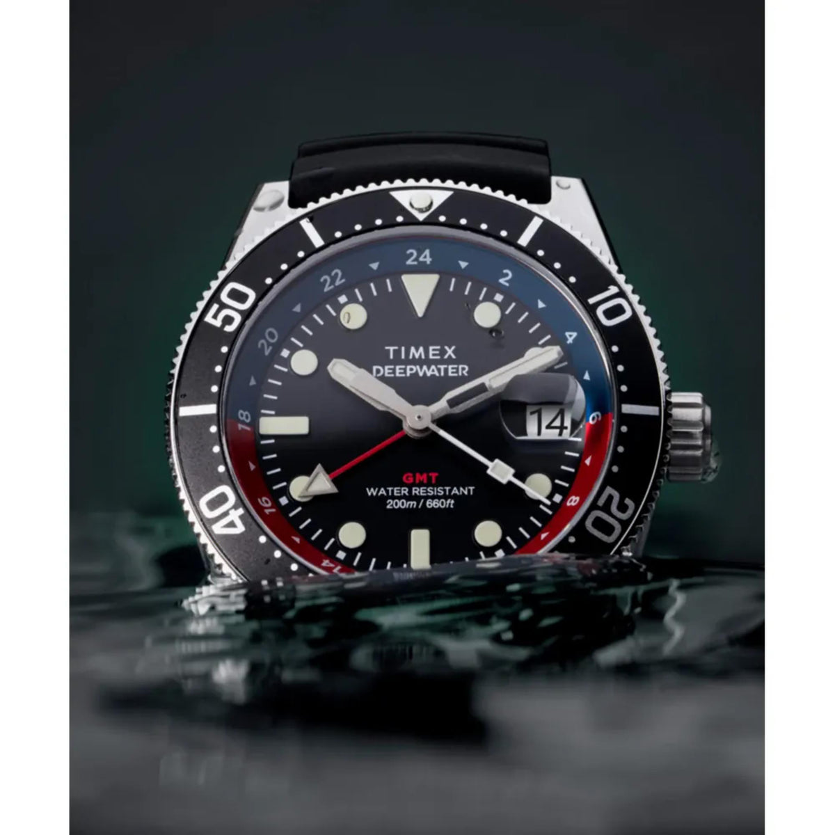Men's black dial GMT quartz diver watch with red accents, black rubber strap, silver case