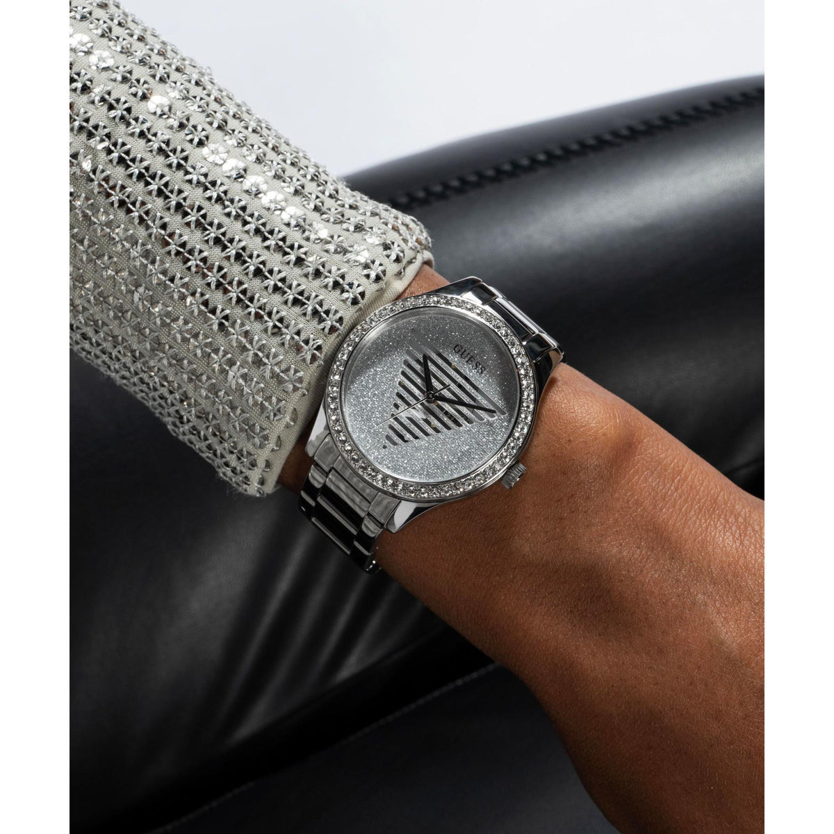 Ladies analog watch with silver dial, stainless steel mesh strap and round bezel