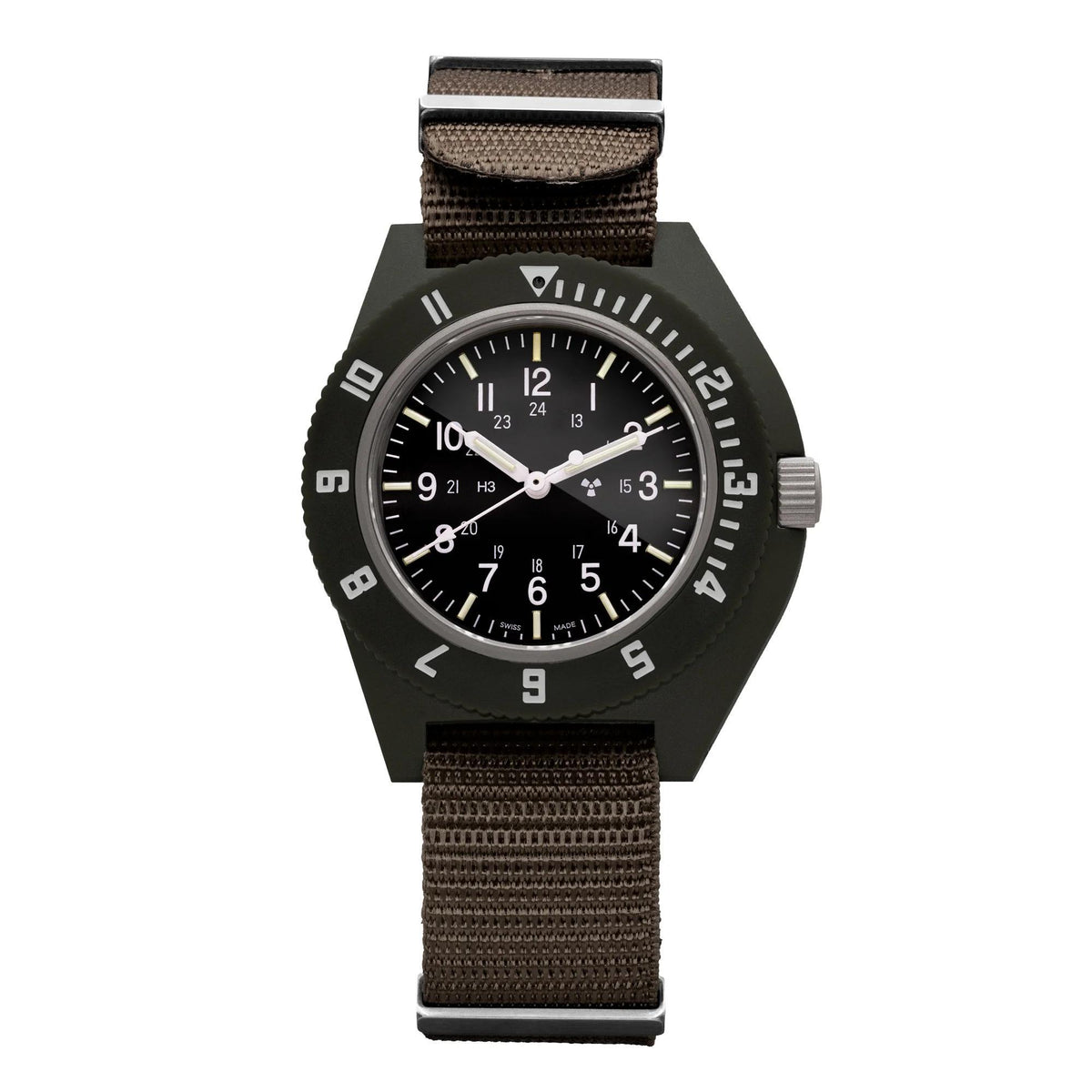 Pilot-style quartz watch with black dial, white hour markers, and dark olive fabric strap.