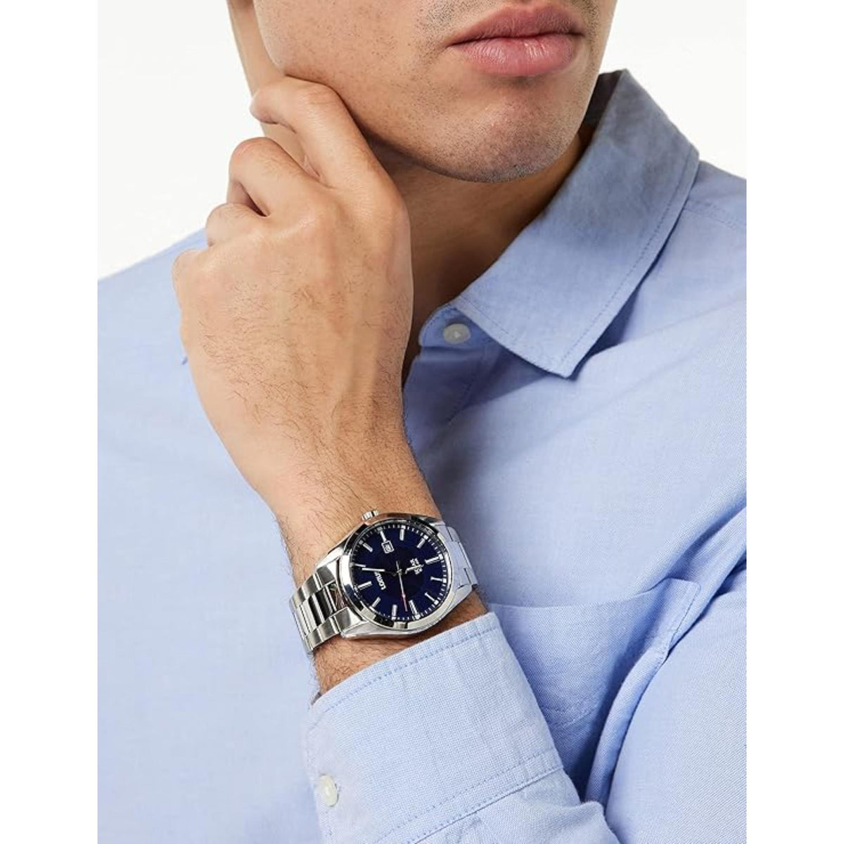 Lorus solar men's wristwatch worn on wrist, blue dial with silver-tone metal bracelet