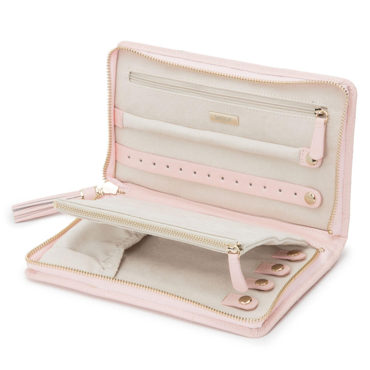 Light pink jewelry portfolio opened to show compartments, zip track, and ring holders