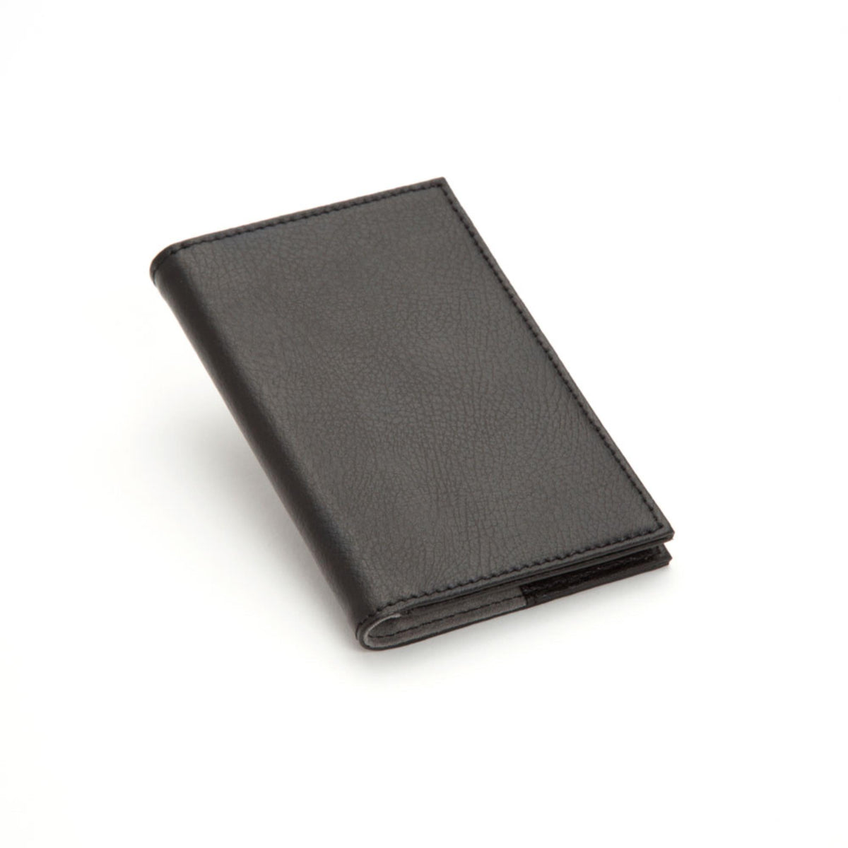 Black leather passport holder, angled side view with rounded bottom corner