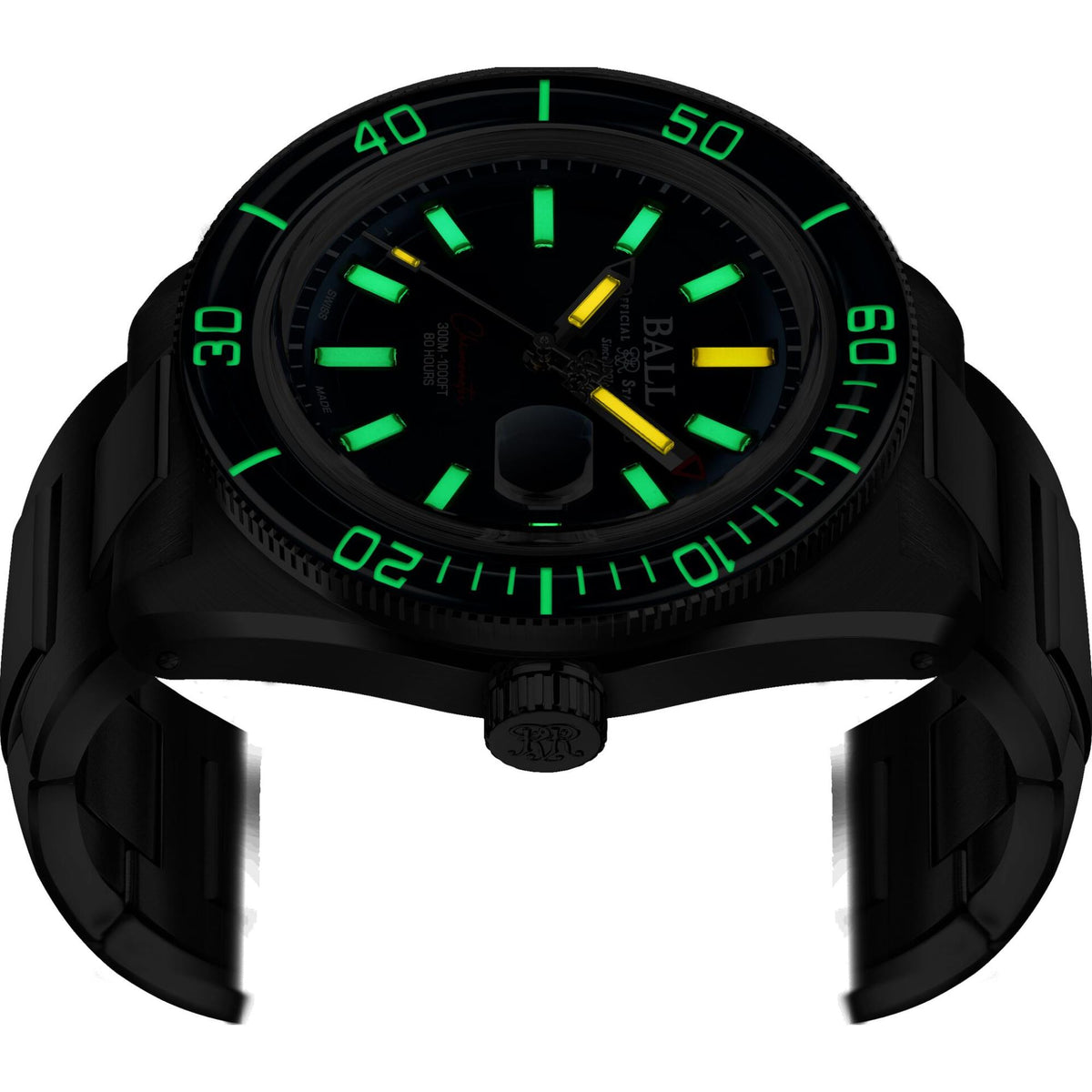 Black diver watch front close-up with green luminous numerals and dark dial