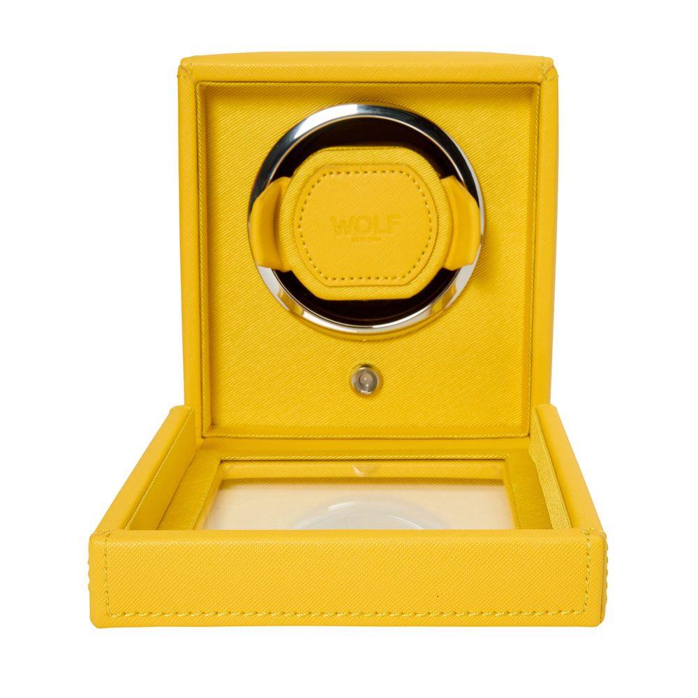 Vibrant yellow watch winder with open hinged lid and circular WOLF logo cushion