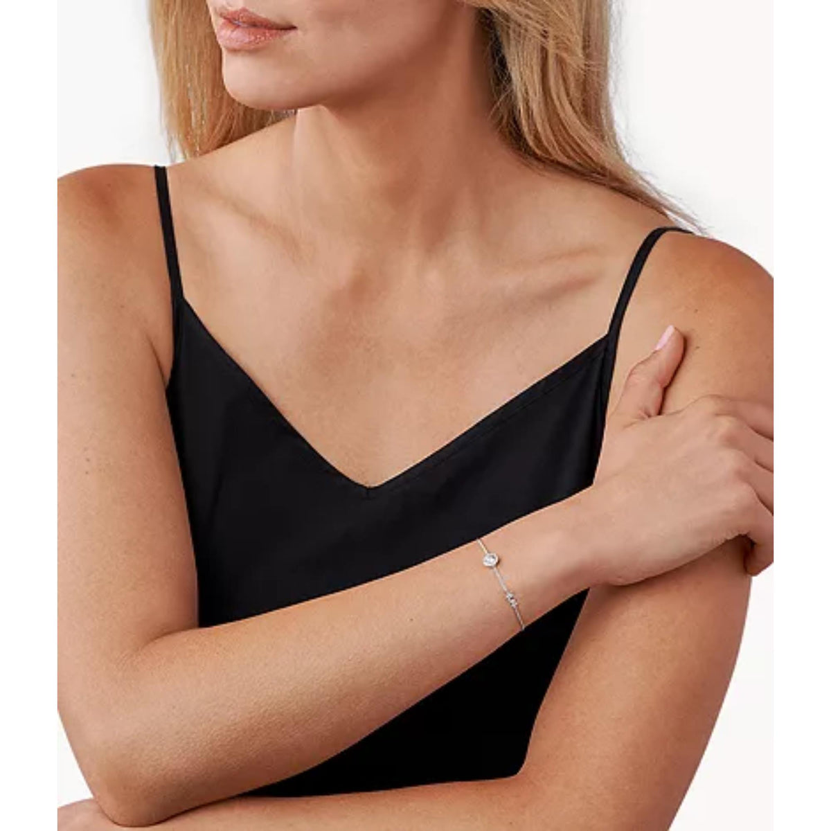 Michael Kors sterling silver halo slider bracelet on a woman's wrist