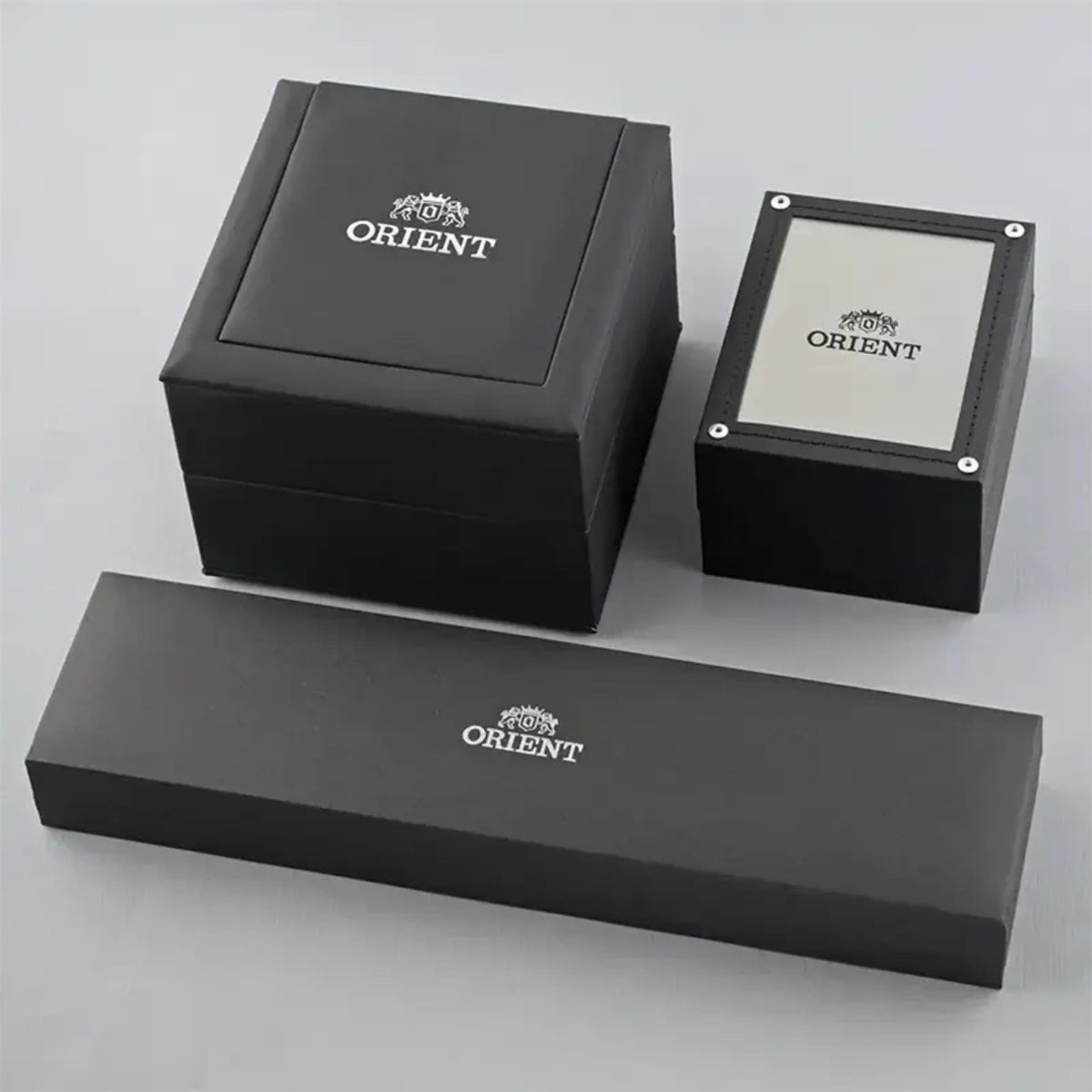 Orient watch presentation boxes and case, black packaging with Orient logo