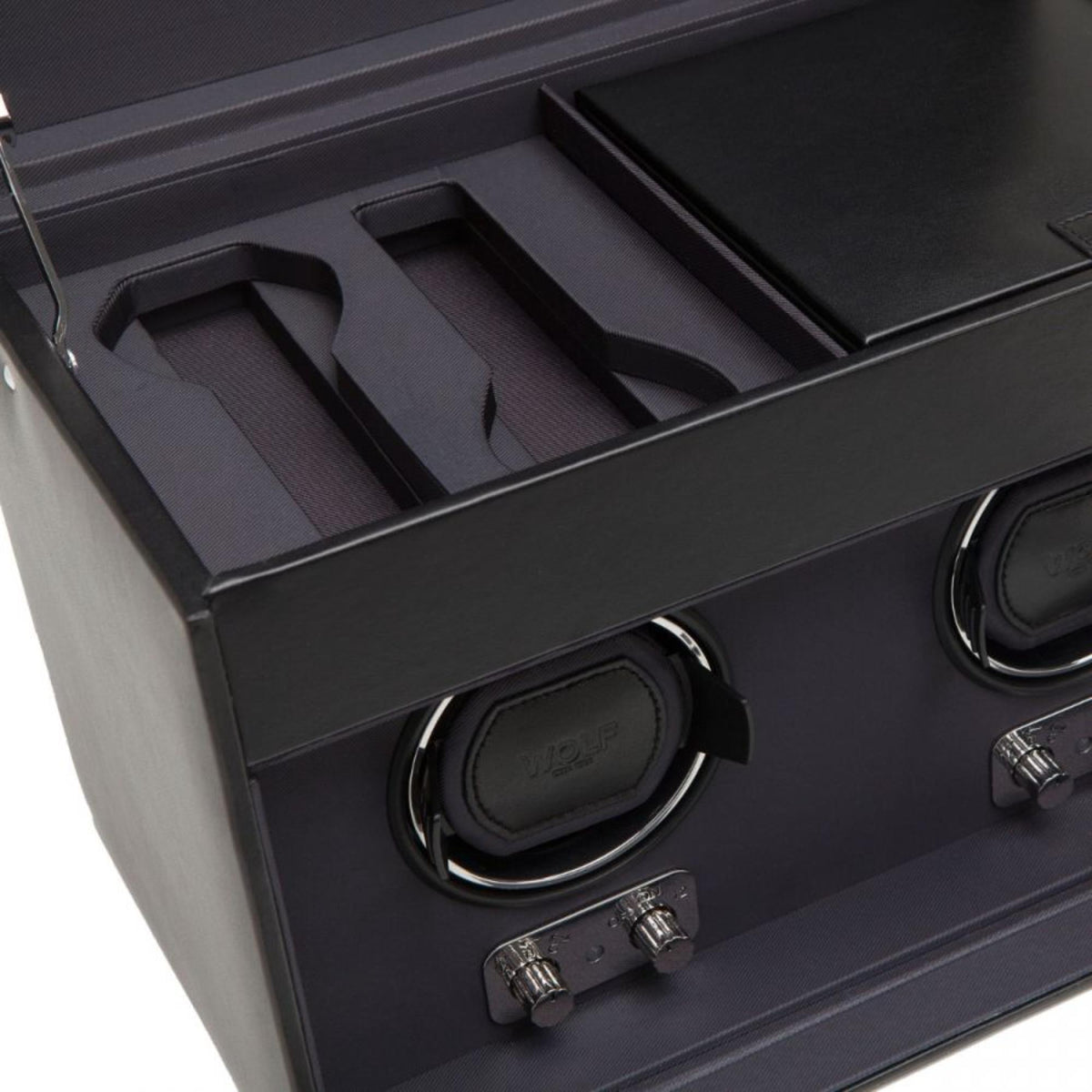 Black leather interior tray with two circular winding pads and metal mounting hardware