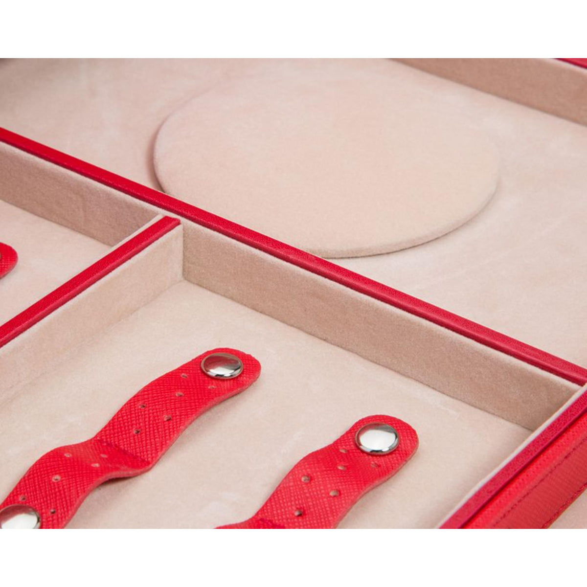 Red jewelry armoire drawer insert with watch straps and padded compartments