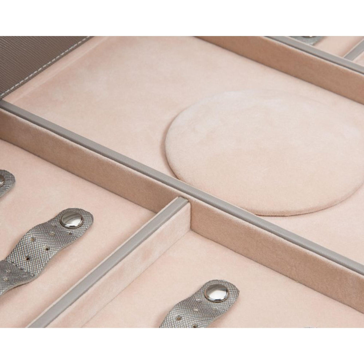 Tan padded jewelry tray insert with oval and circular ring slots