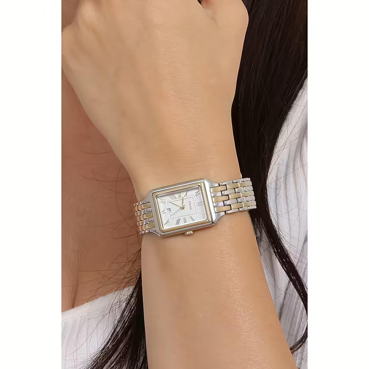Close-up wrist view of the Fossil Raquel ES5368 ladies timepiece highlighting the silver dial display and two-tone steel links