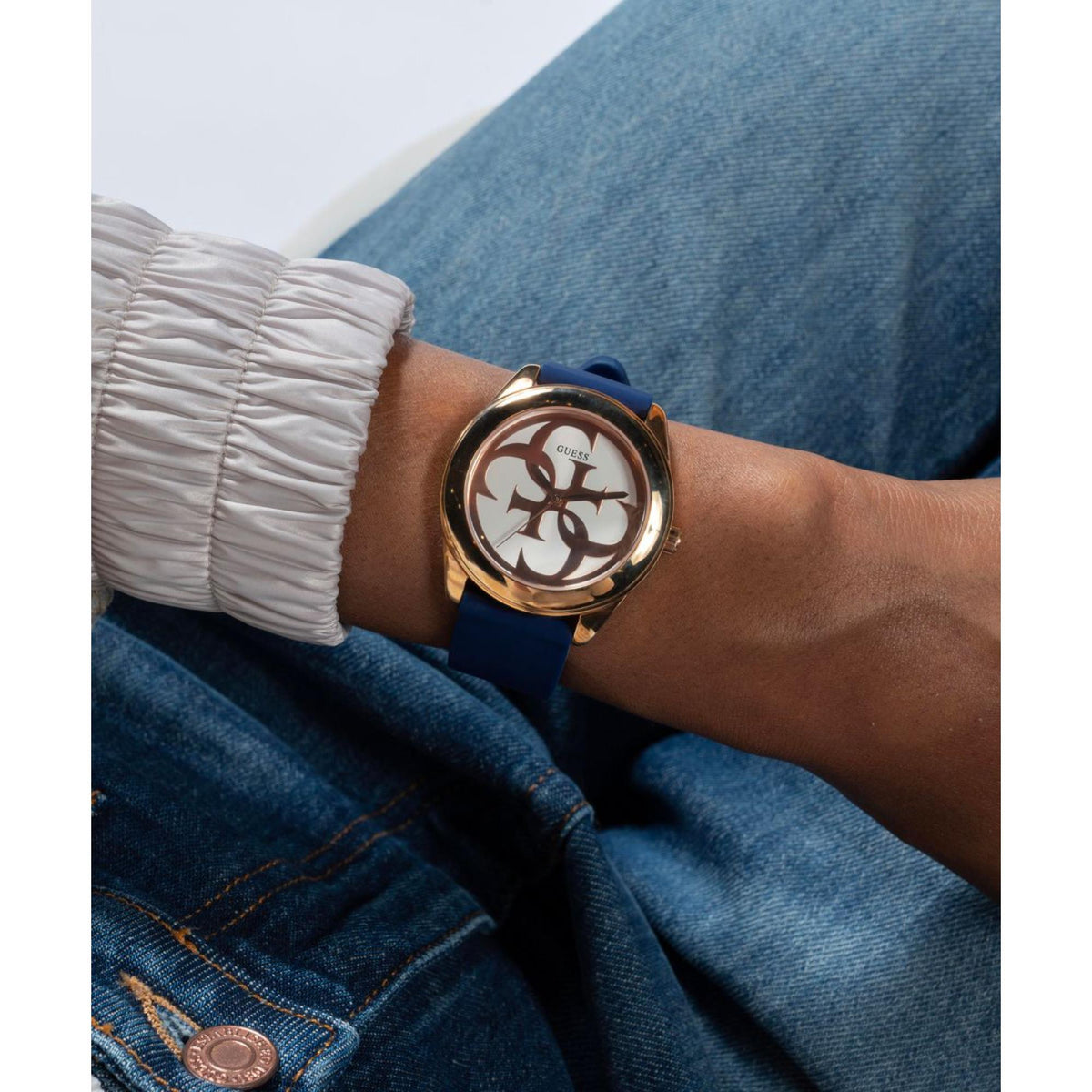 Women's Guess G-Twist silicone strap watch with round gold-tone case and white dial
