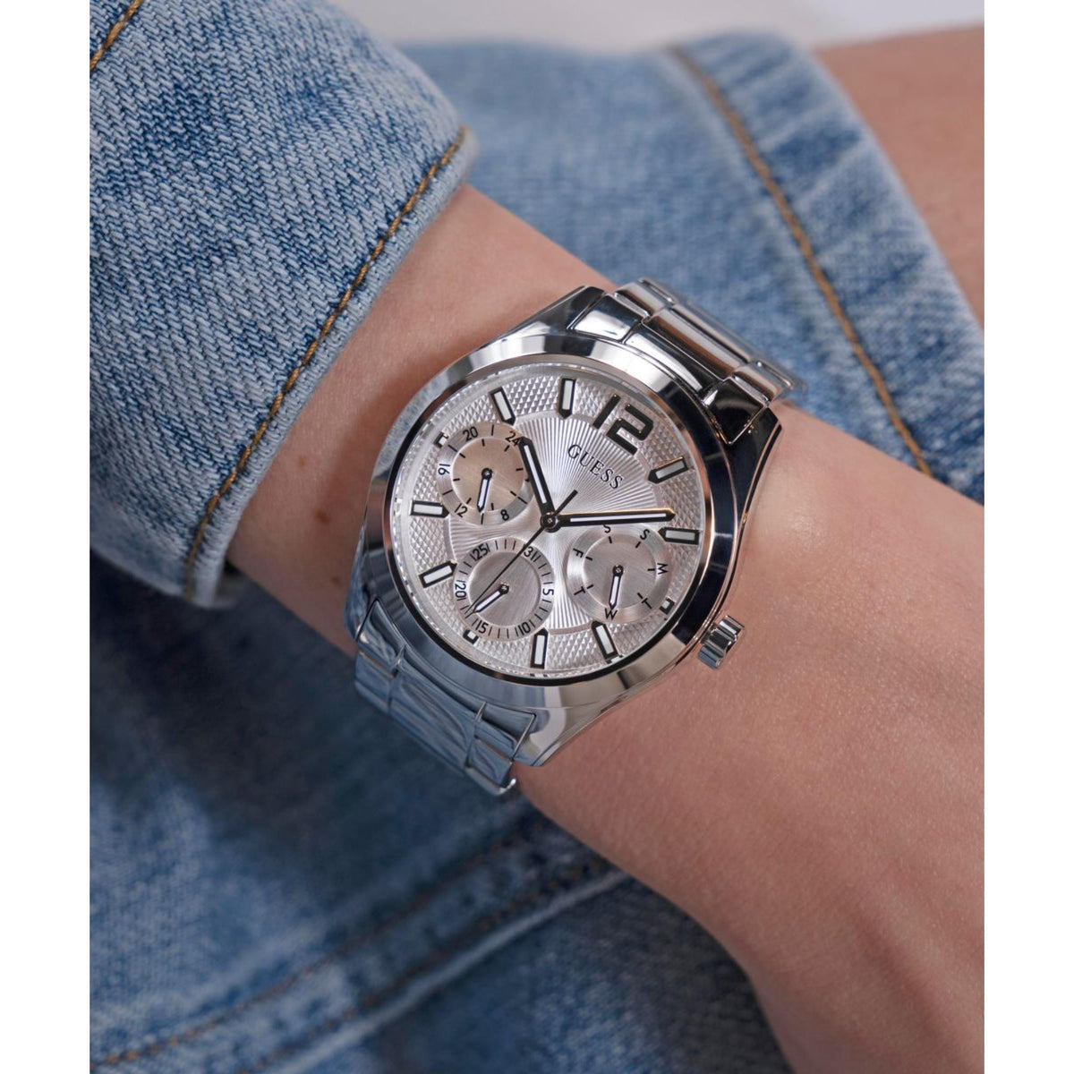 Stainless steel women's watch with silver multi-dial face and metal link bracelet