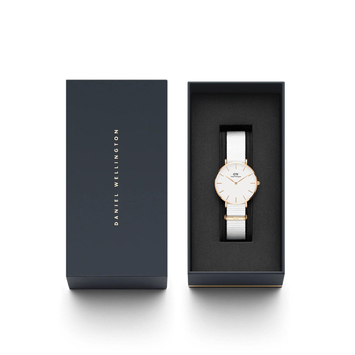 Quartz watch in open gift box with dark NATO strap and rose-gold case