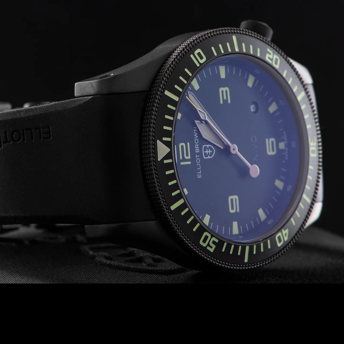 Men's quartz watch with blue dial, black bezel, and black rubber strap