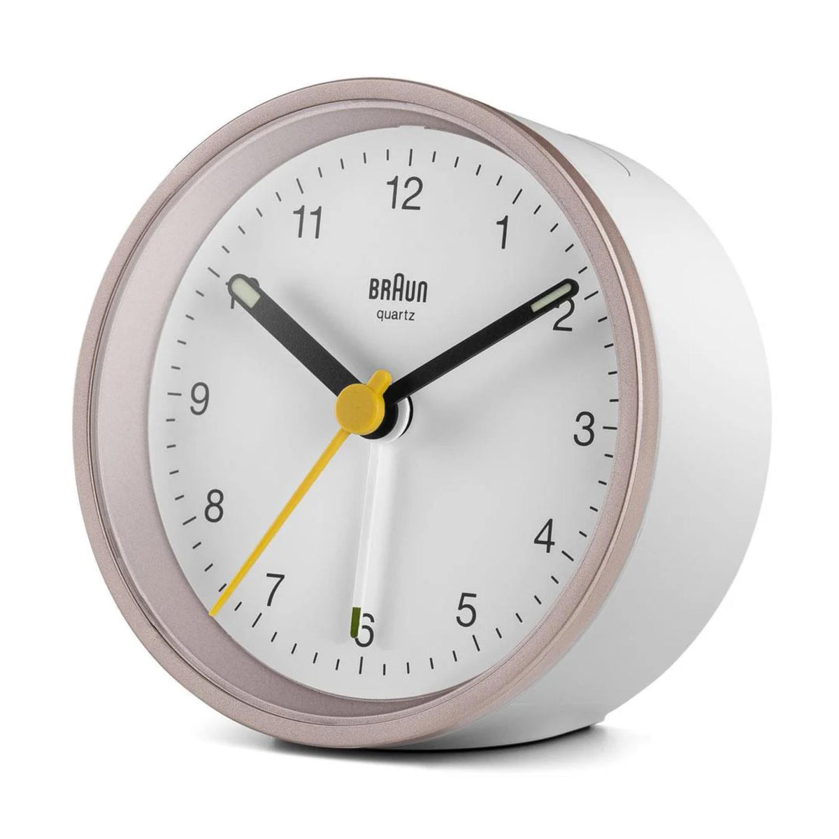 Braun quartz alarm clock close front view with white face and yellow second hand